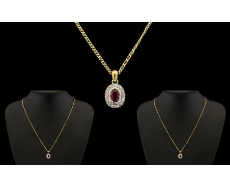 9ct Gold Diamond and Ruby Set Pendant Drop - Attached to a 9ct Gold Chain and Pendant. The Central Ruby Surrounded by 16 Diam