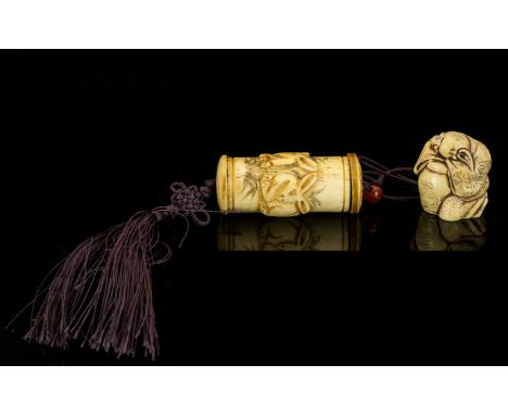 An Oriental Netsuke Style Carving together with a bone tubular Inro with etched rabbit decoration.
