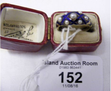 An unhallmarked Georgian seed pearl and blue enamel ring