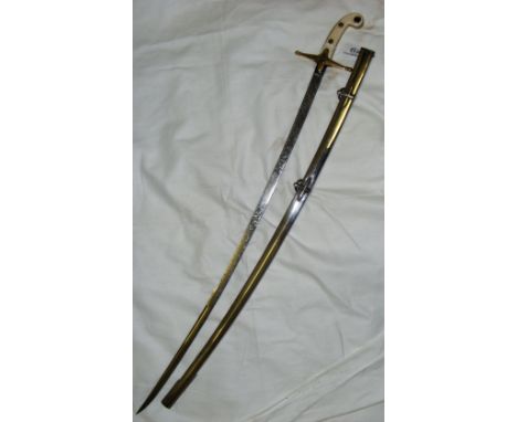 A child's mameluke sword with 70cm etched blade, embossed brass and ivory handle and polished steel scabbard