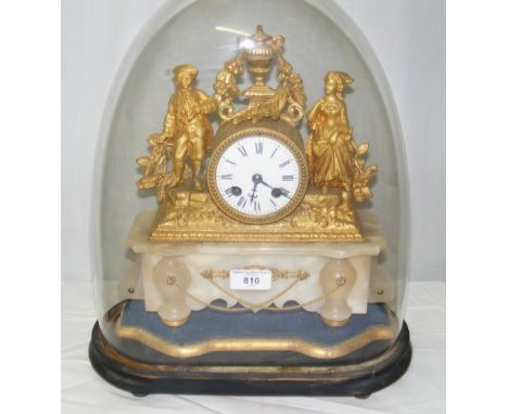 A 19th century French gilt metal and alabaster figural mantel clock with two train striking movement under glass dome