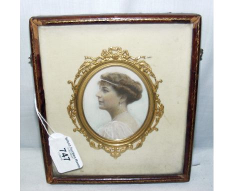 J.E. CORRIE (exhibited 1898-1910) - an oval portrait miniature of Katherine Eleanor Rivers-Fryer, 1916 - inscriptions verso