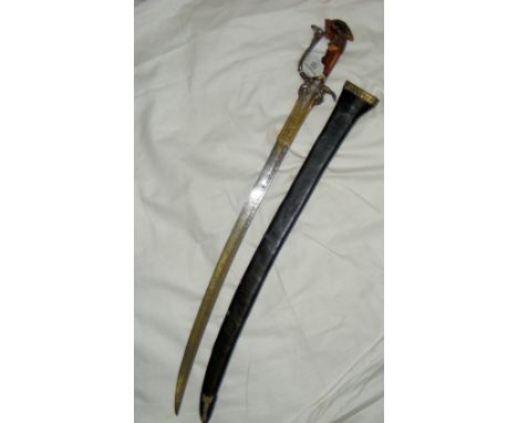 A Singhalese gold and silver mounted kastana with slightly curved 51cm single edged blade, the hilt comprising knuckle guard 