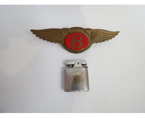 A Bentley Drivers Club lighter and a Bentley winged badge 