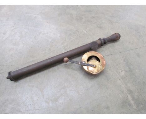 A brass hand pump and a lantern A/F