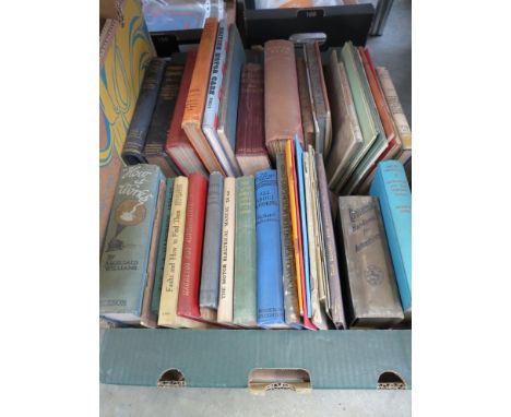 A box of mixed early motoring books including 'Continental hand book for the Motorist', 'How it works' and 'The automobile ha