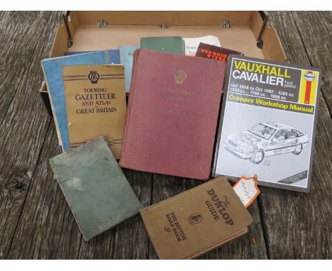 A box of books including Dunlop Guide and 'AA' maps etc 
