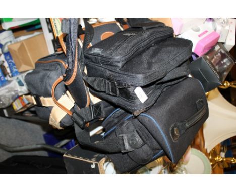 THREE CAMERA BAGS AND CONTENTS TO INCLUDE A CANON CAMERA AND ACCESSORIES 