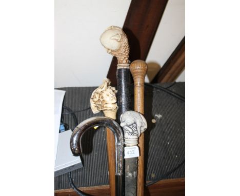 A SELECTION OF VINTAGE WALKING STICKS AND CANES
