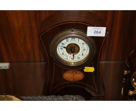 AN EDWARDIAN INLAID MANTLE CLOCK 