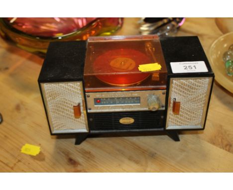 A RETRO MUSICAL RECORD PLAYER SHAPED JEWELLERY BOX