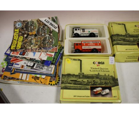 TWO BOXED CORGI UNITED DAIRIES TRUCKS TOGETHER WITH A SELECTION OF FOOTBALL EPHEMERA