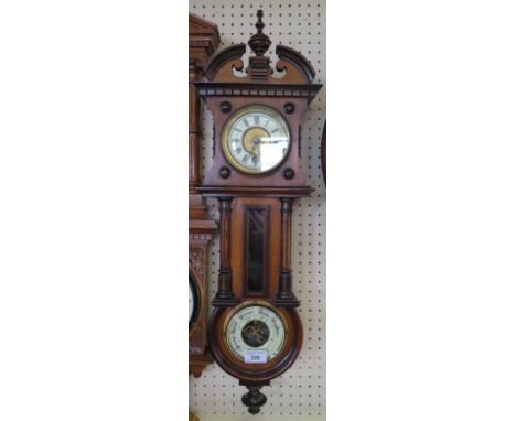 A German Oak Cased Wall Clock with aneroid barometer to base, 71 cm high