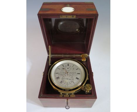 A Thomas Mercer Marine Chronometer with chain driven fusee movement and in original mahogany and brass mounted case, the four