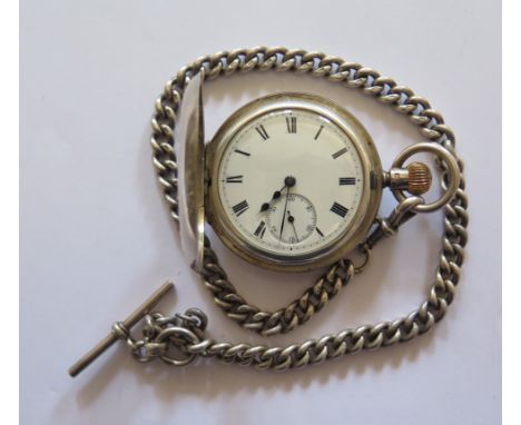 A Victorian Silver Cased Half Hunter Pocket Watch by Primavesi Bros. Bournemouth, London 1875 on a heavy silver Albert with T