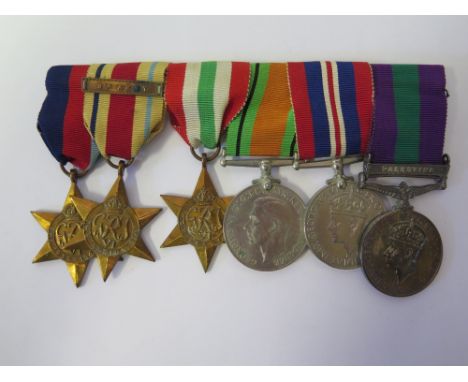 A WWII and Later Six Medal Group including 39-45 Star, Africa Star with 8th Army Bar, Italy Star and General Service Palestin