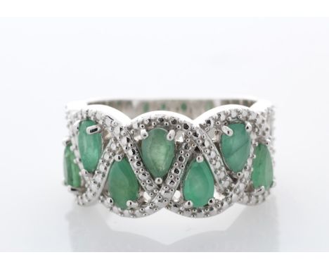 Silver Emerald Ring - Valued By AGI £285.00 - Sterling silver emerald ring, set with seven pear shaped emeralds. Clarity-, Ce