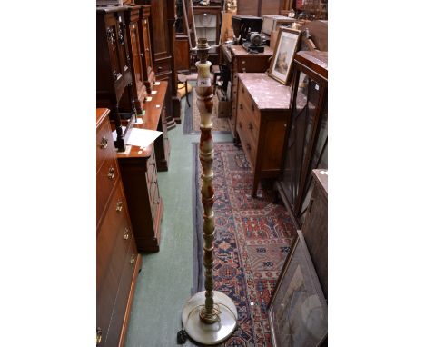 A turned onyx standard lamp, on onyx base