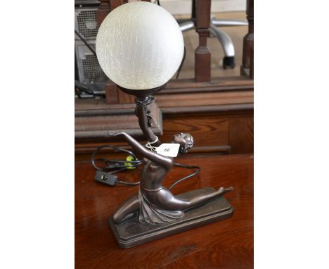 An Art Deco style lamp as a kneeling lady