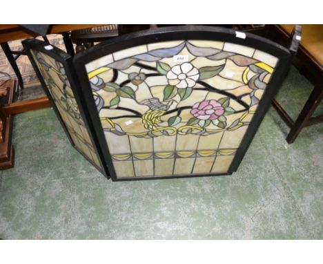A leaded glass style triptych firescreen, bird and flower decoration