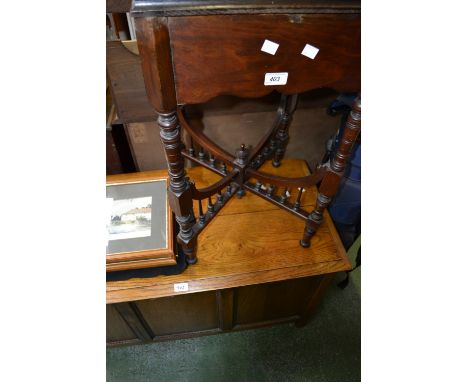 A light oak blanket box; an occasional table.