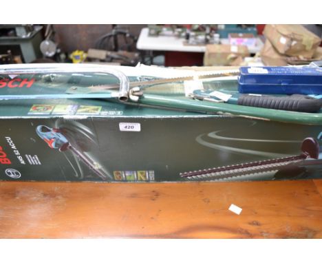 A Bosch hedge trimmer, battery powered; five assorted tools