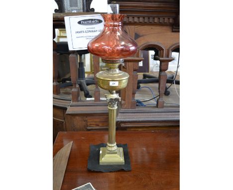 An Edwardian brass Corinthian column oil lamp