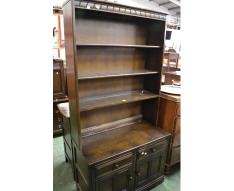 An Ercol bookcase cabinet