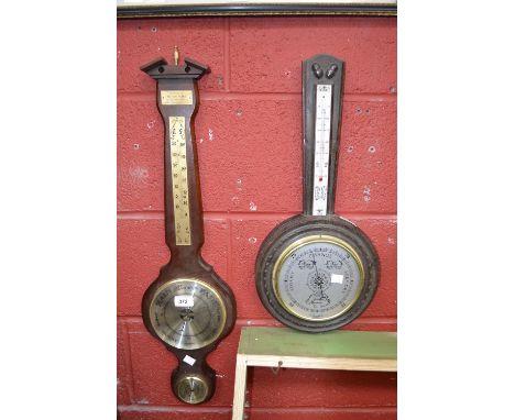 A carved oak framed banjo barometer thermometer, Shortland Manchester, silvered dial and scale, another reproduction, applied