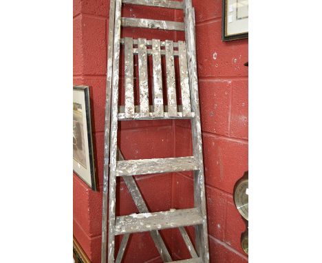 A vintage six rung step ladder.