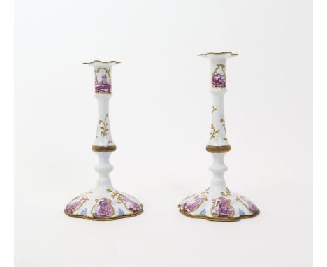 A good pair of Birmingham or South Staffordshire enamel tapersticks  c.1760-65, made in two sections and joined with a gilt m