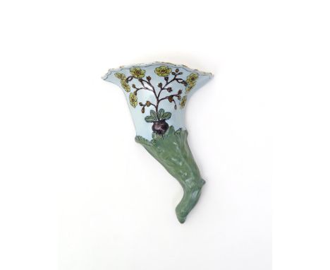 A Liverpool delftware polychrome wall pocket  c.1760, formed as a cornucopia, moulded in shallow relief with a large yellow f