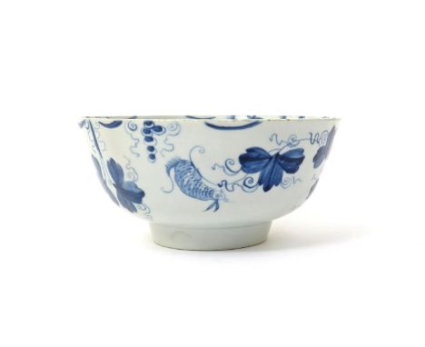 A rare Worcester blue and white bowl  c.1755, painted with the Squirrel and Vine pattern, the exterior with two of the styliz