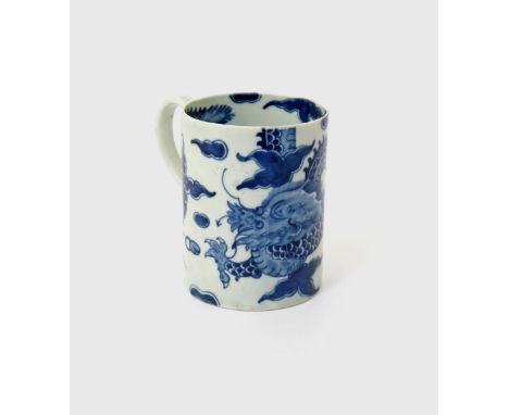 A good Worcester blue and white mug  c.1760, the compact cylindrical form well painted with the Dragon pattern, the sinuous s