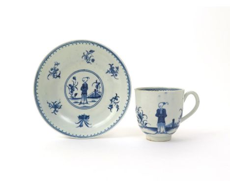 A Worcester blue and white coffee cup and saucer  c.1770, painted with the Waiting Chinaman pattern, the single standing figu