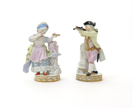 A pair of Meissen figures of a boy and girl firing arrows  19th century, after the models by Acier, the boy taking aim with a