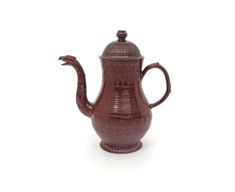 A Staffordshire glazed redware coffee pot and associated cover   c.1770, the pear-shaped body engine-turned with a fine desig
