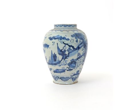 An English delftware vase  mid 18th century, perhaps Bristol, the ovoid form painted in blue with a Chinese figure carrying a