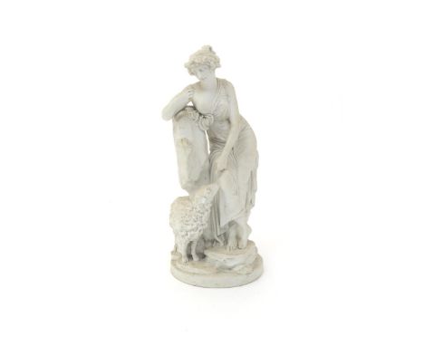A Continental biscuit porcelain figure of a shepherdess  late 18th/early 19th century, wearing Classical robes, standing and 