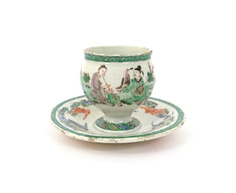 An unusual French faïence cup on stand  late 18th century, the generous rounded cup well painted in the famille verte palette