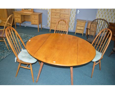 Ercol Oval Drop Leaf Dining Table with Three Ercol Bentwood Spindleback Chairs, and Two Similar Chairs