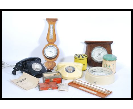 A collection of vintage items to include vintage GEC black bakelite phone, Northern Telecom circular phone, Metamec circular 