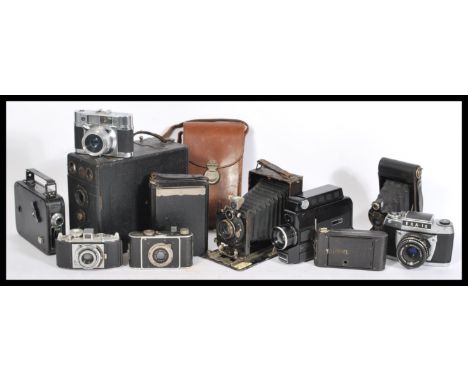 A selection of vintage film cameras to include&nbsp;Meyer-Optik Domiplan 50mm, a Kodak vest Pocket special camera, Ogima Anas