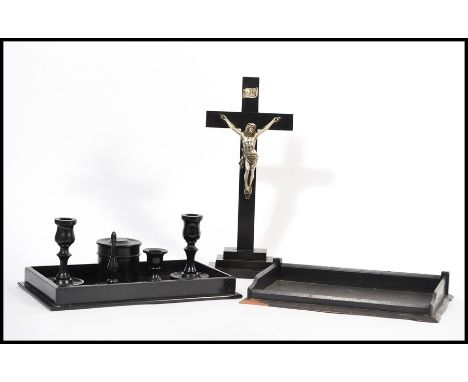 A vintage 20th Century Ebony dressing table set, stamped to the base, together with an ebonised cross with a silver plated ca