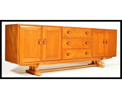 Lucian Ercolani - Ercol - Windsor - An unusual rare mid 20th century long beech and elm wood sideboard credenza comprising of