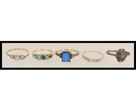 A selection of vintage rings to include a stamped 9ct gold and silver ring set with a square cut faceted blue stone with pier