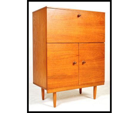 Avalon - Avalon Yatton - A 1960's British retro vintage teak wood cocktail cabinet comprising of a drop down cupboard reveali