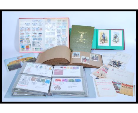 A selection of stamps to include a full album of British stamps dating from Victorian examples including penny red, two pictu