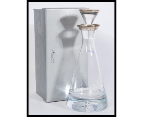 A Boadway glass pyramid decanter having a silver hallmarked collar / ring to the top in a Broadway box. Hallmarked Birmingham