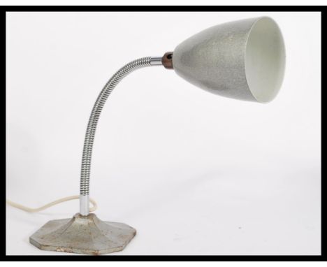 An vintage 20th century Industrial retro anglepoise lamp having a goose neck raised on a square base with a pendant shade. As